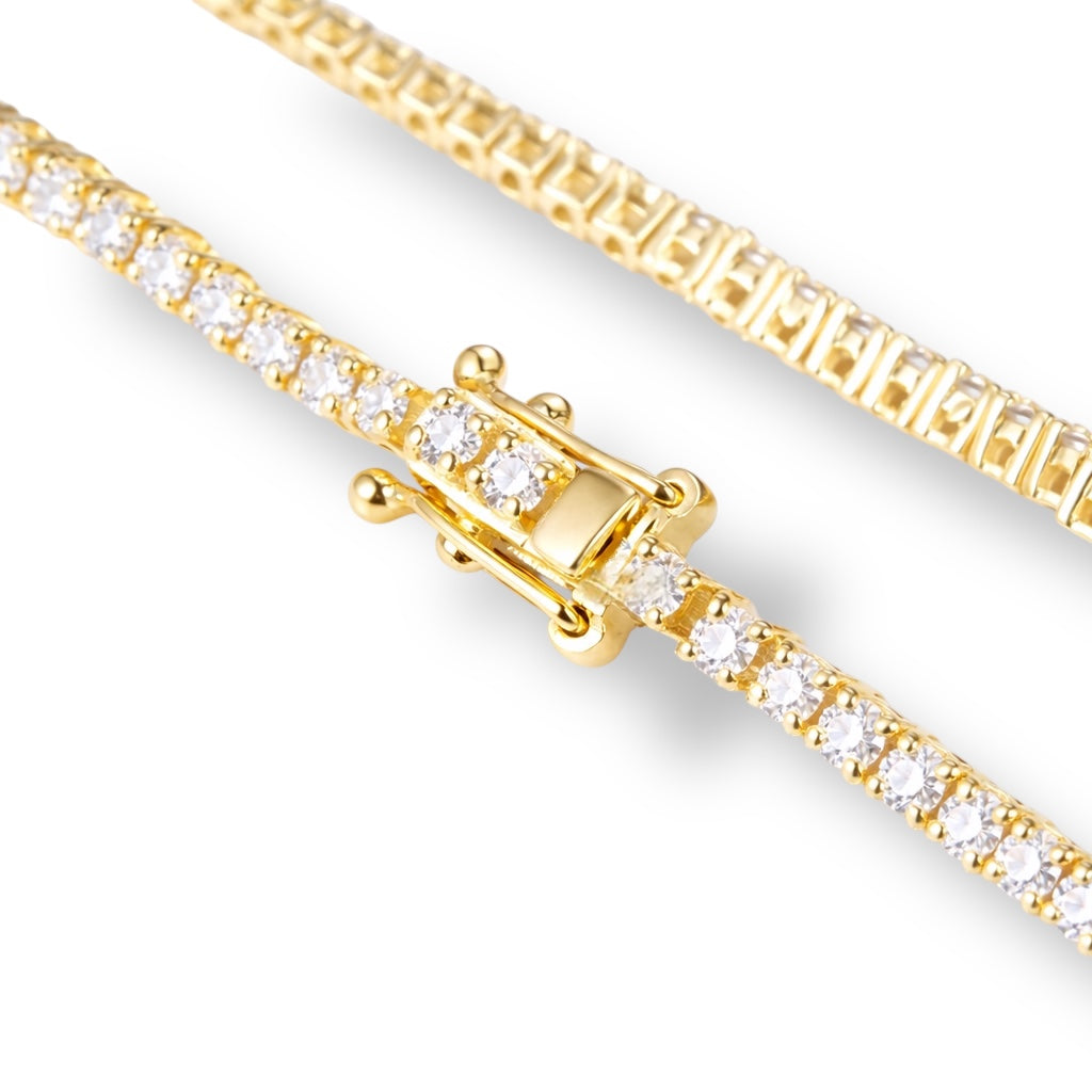 Tennis Bracelet with Bezel Emerald-Cut Centre Stone